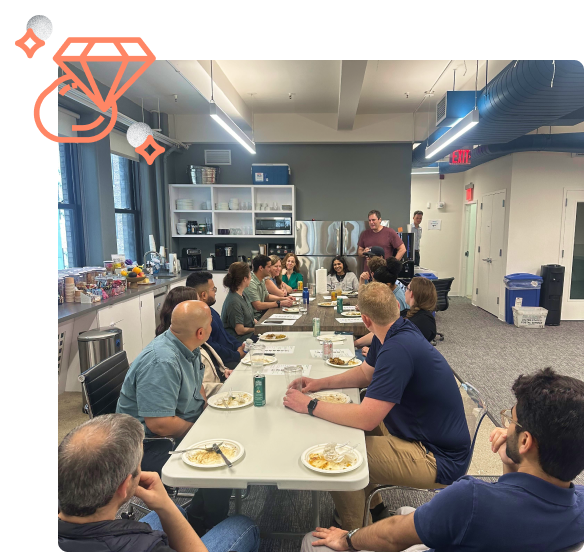 employees sitting around a meeting table