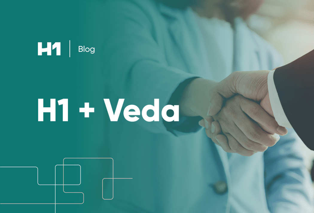 H1 + Veda with professionals shaking hands