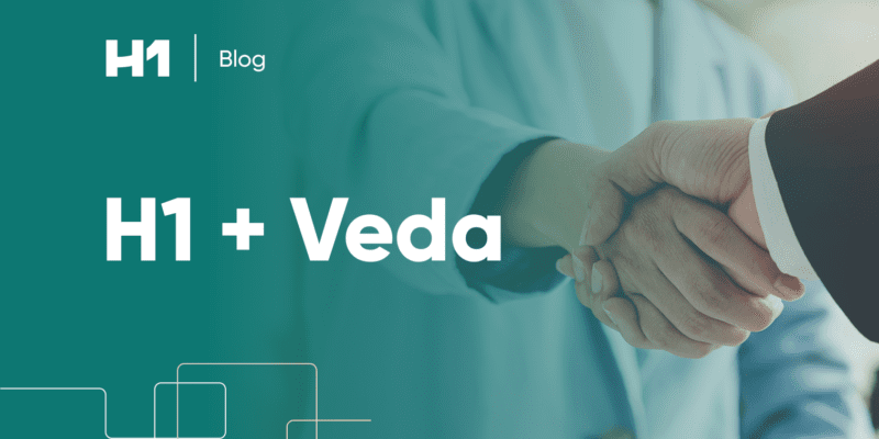H1 + Veda with professionals shaking hands