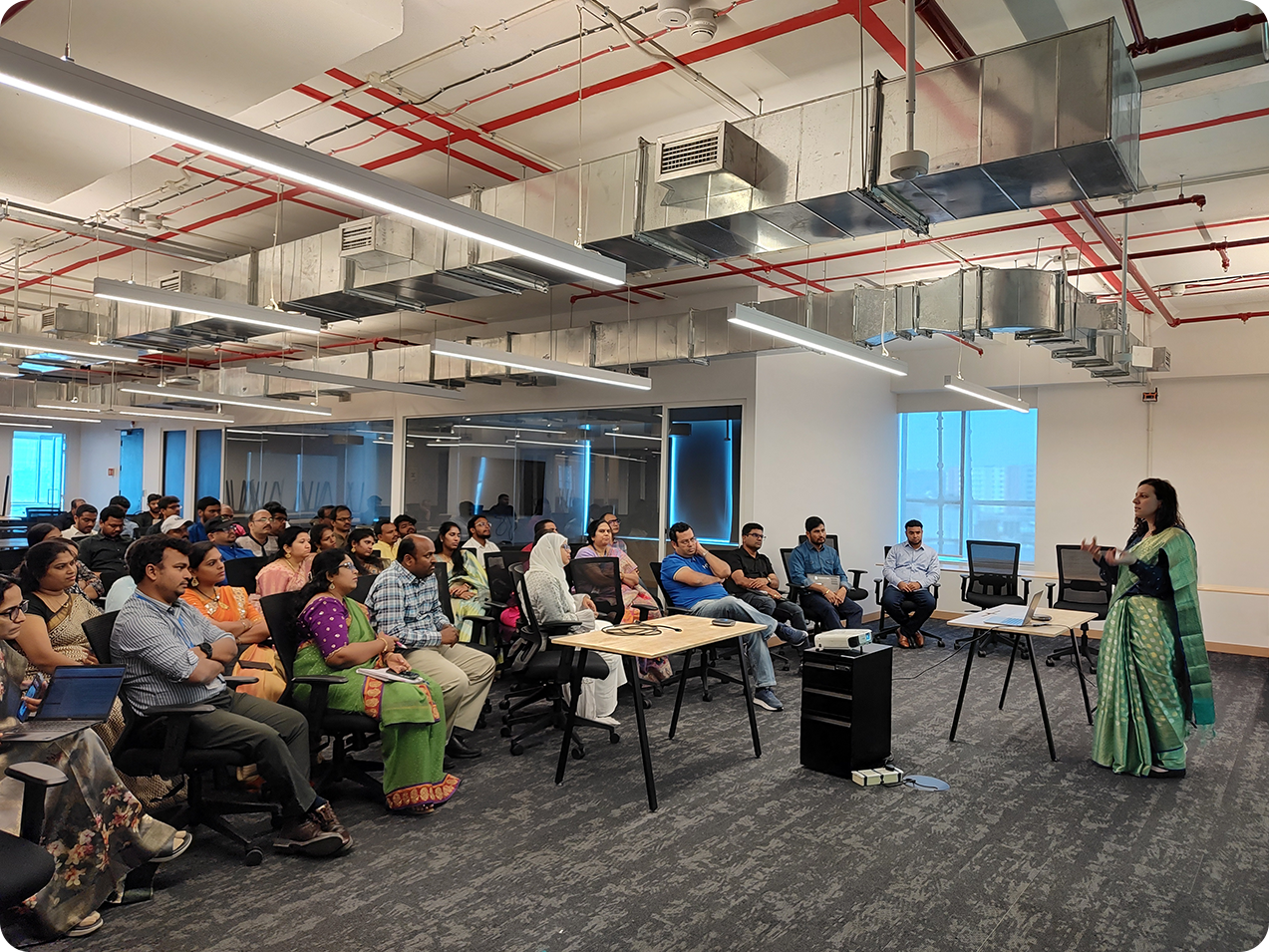 Expert speaker presenting to a group of colleagues